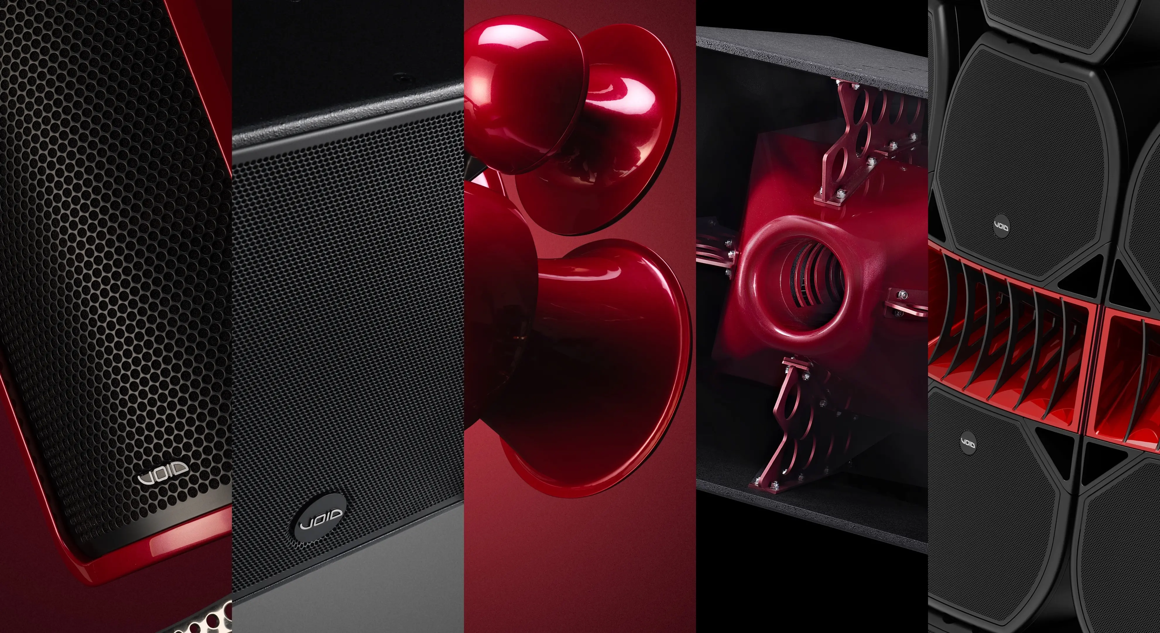 A full range of red and black Void Acoustics loudspeaker systems displayed vertically